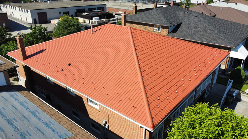 Aerial view of an orange steel tile roof